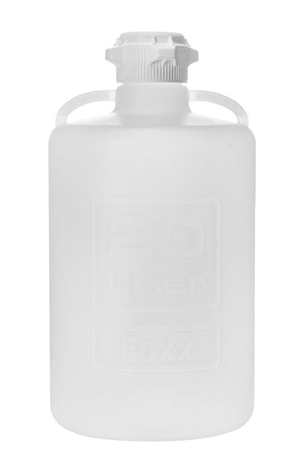 White plastic bottle with a cap on a white background