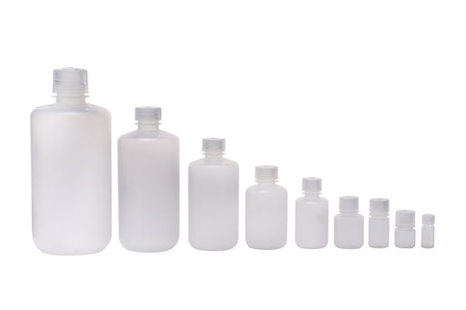 Set of white plastic bottles of various sizes on a white background